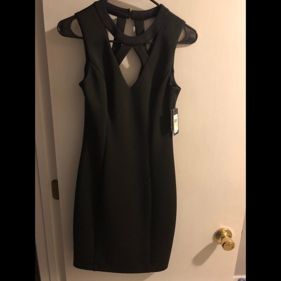 Guess Dresses & Skirts - Black Guess Cocktail Dress sz 4